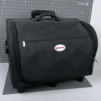 Bernina Sewing Machine and Accessory Case - Rolling and has a Handle.