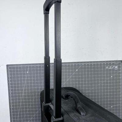 Bernina Sewing Machine and Accessory Case - Rolling and has a Handle.
