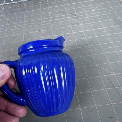 Blue Cased Glass Cream Pitcher (white on the inside) 