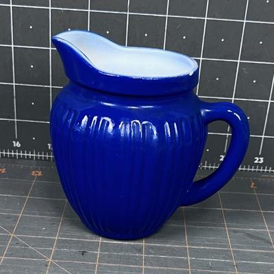 Blue Cased Glass Cream Pitcher (white on the inside) 