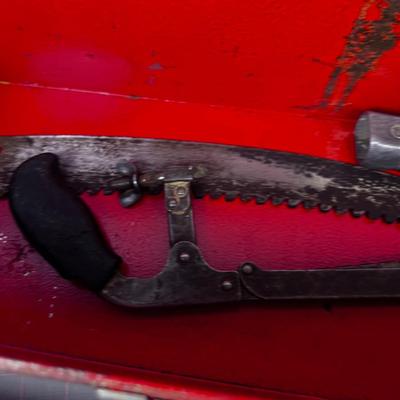 Tool Box with Tools: Pipe Wrench and Saw