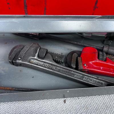 Tool Box with Tools: Pipe Wrench and Saw