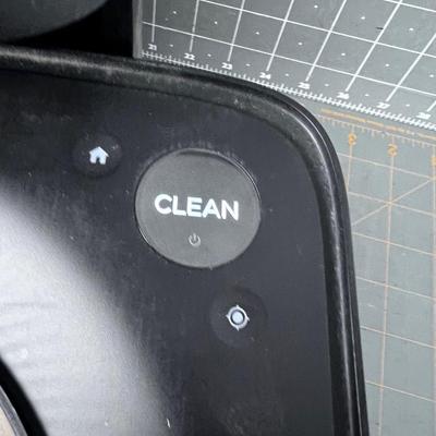Roomba Self Vacuuming Device