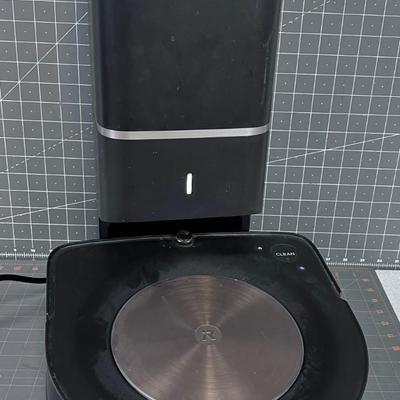 Roomba Self Vacuuming Device