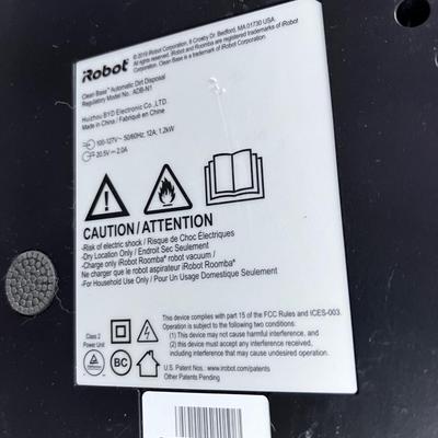 Roomba Self Vacuuming Device