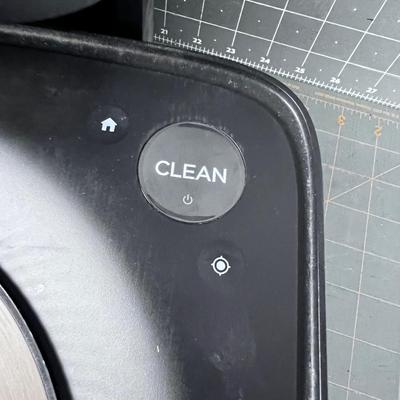 Roomba Self Vacuuming Device