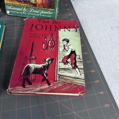 6 books: Little Women, Honey Bunch, etc. 