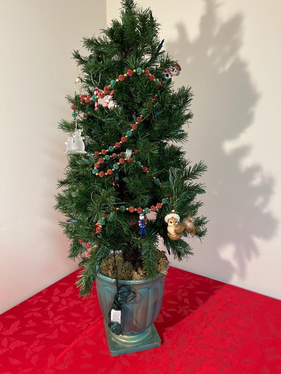 78 lighted tree in urn
