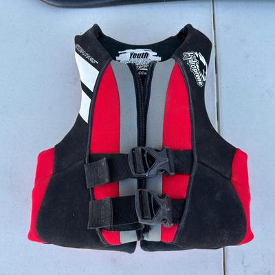 HO! SPORTS WAKEBOARD AND 2 YOUTH LIFE VESTS