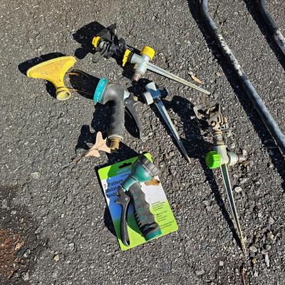 Two Suncast Mobile Hose Carts, Extra Hoses & More  (FY-JS)