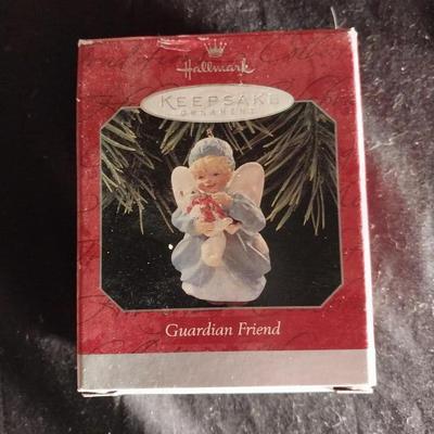THREE KEEPSAKE ORNAMENTS BY HALLMARK
