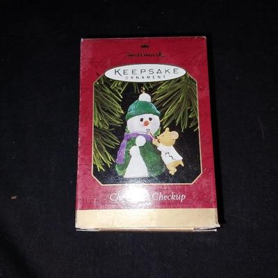 THREE KEEPSAKE ORNAMENTS BY HALLMARK