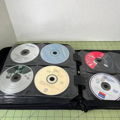 CD Case with CD's and DVD's included