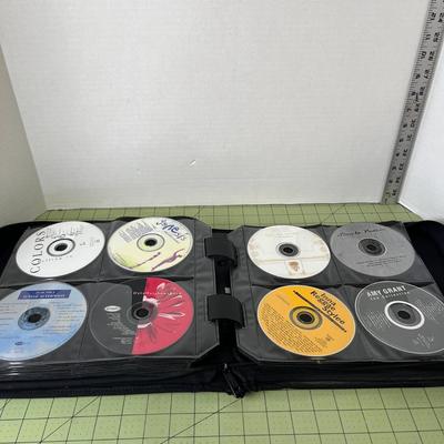 CD Case with CD's and DVD's included