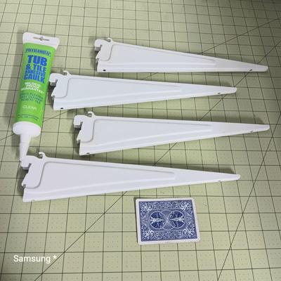 Shelving Hooks and Caulk 