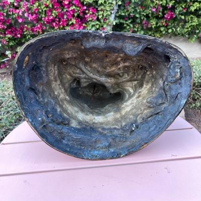 25.  ANTIQUE CAST BRONZE BUDDAH SEATED ON DRAGON THRONE TIBET