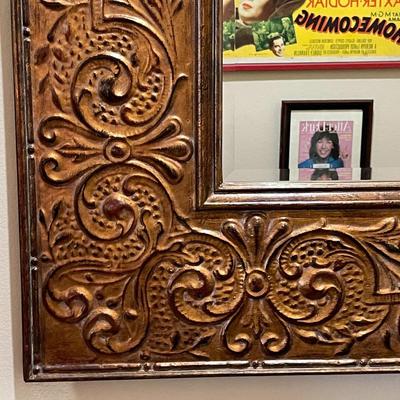 29.  LARGE FRAMED BEVELED DECORATIVE MIRROR