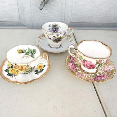 LEFTON HAND PAINTED AND 2 OTHER SETS OF BONE CHINA CUP AND SAUCERS