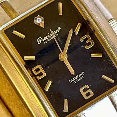 37.  VINTAGE PRECISION BY GRUEN DIAMOND QUARTZ MENS WRIST WATCH BLACK FACE