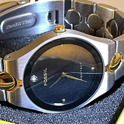 39.  FOSSIL ARKITEKT MENS WRISTWATCH IN TIN STAINLESS STEEL BLACK FACE
