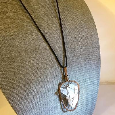 42.  RAW CRYSTAL PENDANT COPPER WIRE CAGE