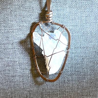 42.  RAW CRYSTAL PENDANT COPPER WIRE CAGE