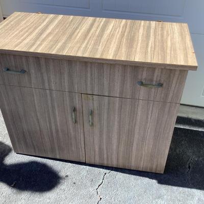 Modern chest, vinyl covered drawer with 3 separated sections, 2 door, with 2 shelves 27