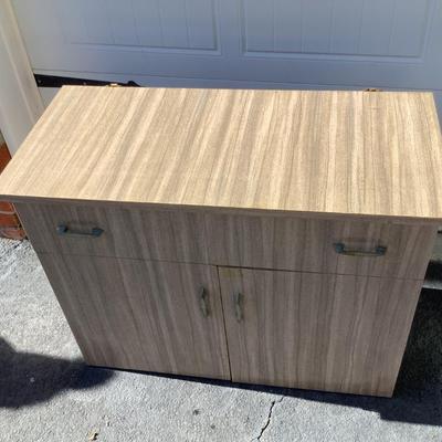 Modern chest, vinyl covered drawer with 3 separated sections, 2 door, with 2 shelves 27
