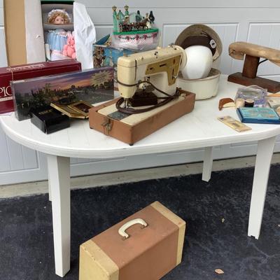 Vintage wig case head form and hat, Singer sewing machine w/foot pedal, table top ironing board, puzzle NIB, doll