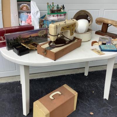 Vintage wig case head form and hat, Singer sewing machine w/foot pedal, table top ironing board, puzzle NIB, doll