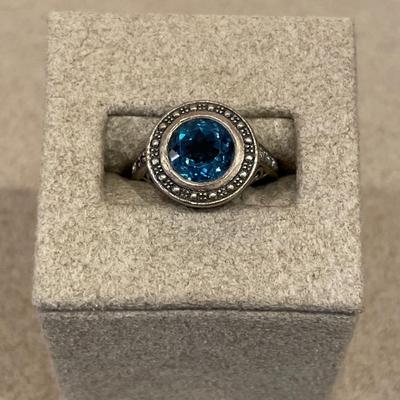 Round blue stone ring in silver