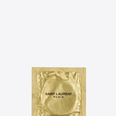 Exclusive Saint Laurent Paris condom in gold foil