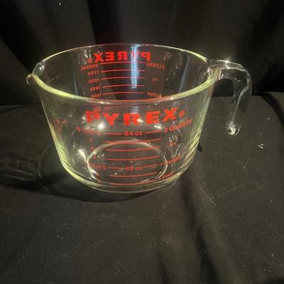 Four Pyrex Measuring Cups (K-MG)