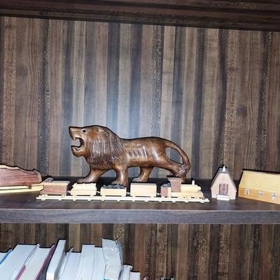 WOODEN CARVED LION, TRAIN AND MINIATURE BUILDINGS