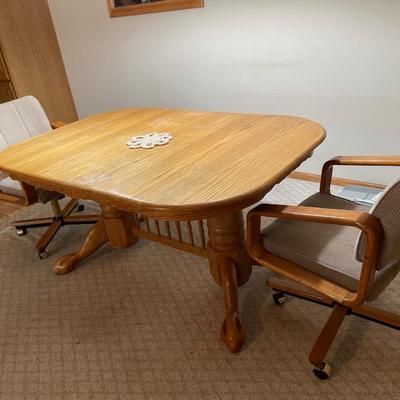 Oak dining room table and 2 chairs