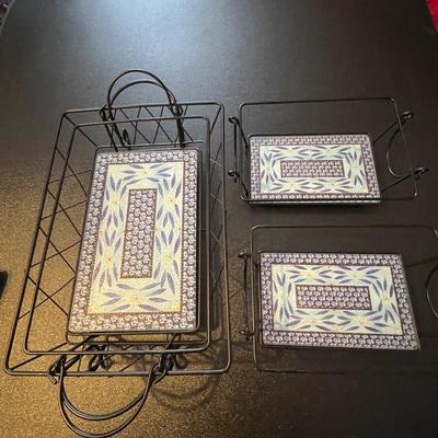 THREE PIECE TRIVETS AND HANDLED CARRIERS