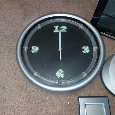 FOUR BATTERY OPERATED CLOCKS-ALWAYS KNOW WHAT TIME IT IS