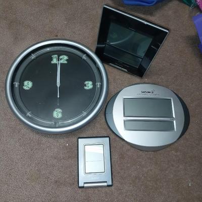 FOUR BATTERY OPERATED CLOCKS-ALWAYS KNOW WHAT TIME IT IS