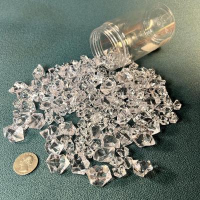 JAR OF CLEAR ICE-LIKE FILLER