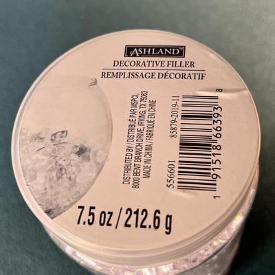 JAR OF CLEAR ICE-LIKE FILLER