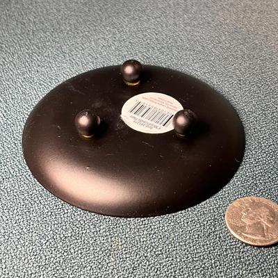 FOOTED METAL CANDLE HOLDER