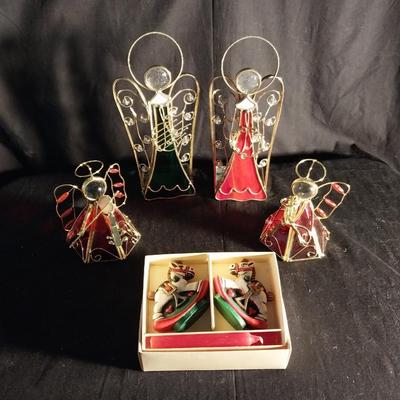 FOUR ANGEL CANDLE HOLDERS AND ROCKING HORSE CANDLES