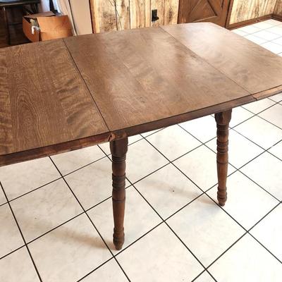 Lot #97  Vintage Drop Leal Table, marked "Rockingham"
