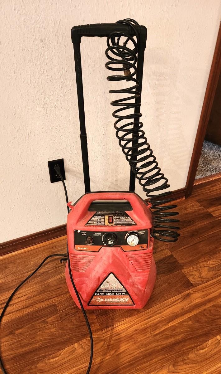 Lot 108 Husky Easy Air To Go portable Air Compressor