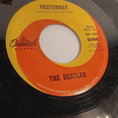 Three Beatles Records LPs - Yellow Submarine - Yesterday - Revolution