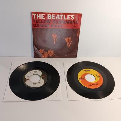 Three Beatles Records LPs - Yellow Submarine - Yesterday - Revolution