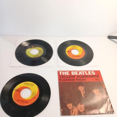 Three Beatles Records LPs - Yellow Submarine - Yesterday - Revolution