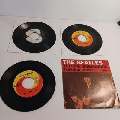 Three Beatles Records LPs - Yellow Submarine - Yesterday - Revolution
