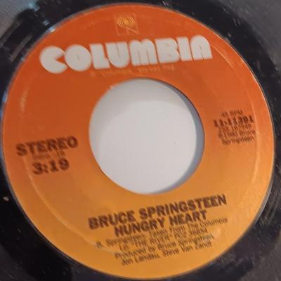 Collection of 45 Records - Eagles - Queen - Cheap Trick - Bruce Springsteen & more