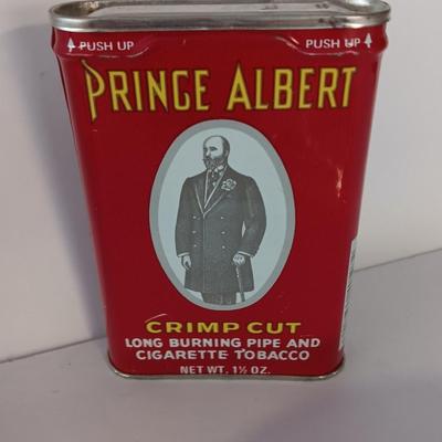 Tin tobacco tins and Collectible Coors pottery ashtray